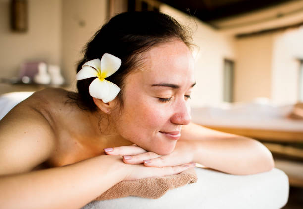 istock Woman relaxing from a spa treatment 1003603426