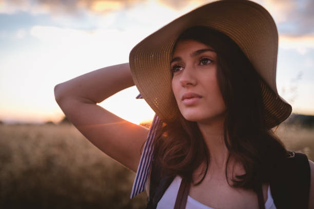 istock Gorgeous young woman in sunset 1003603542