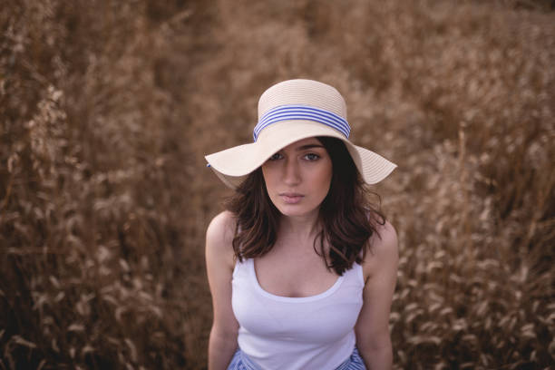 istock Beautiful young retro looking woman in nature 1003605202