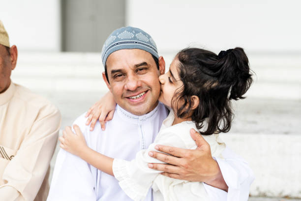 istock Muslim father and his daughter 1003606374