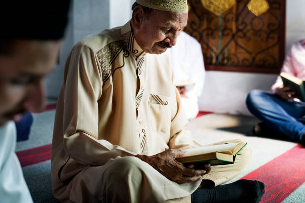 istock Muslim men reading Quran during Ramadan 1003609230