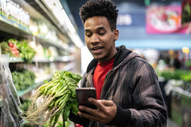 istock Customer Making a Video Chat at Supermarket 1003611548