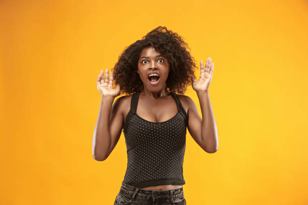 istock Beautiful woman looking suprised 1003618700
