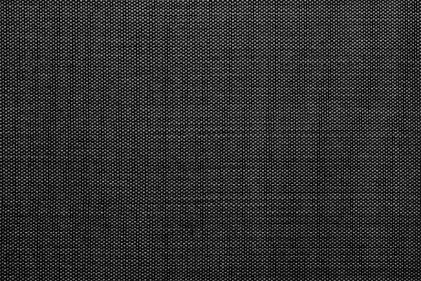Photo of Black cotton shirt texture.