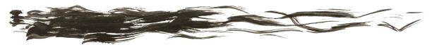 istock Long hand drawn isolated paintbrush stripe with dirty black color 1003624460