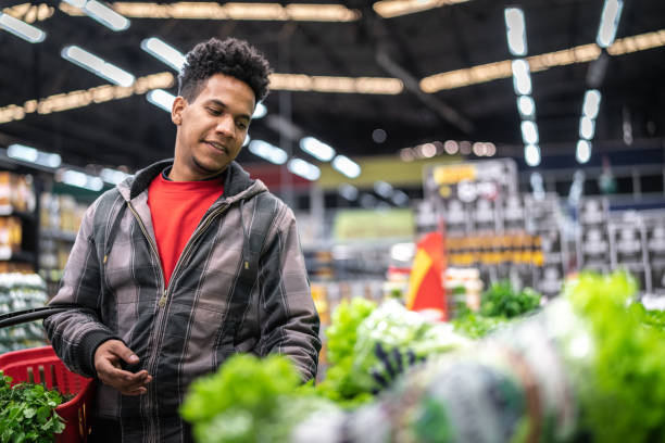 istock Customer Buying Greens on Supermarket 1003627530