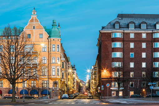 Helsinki, Finland. Residential House Building At Intersection Of Merikatu, Neitsytpolku And Puistokatu Streets In Winter Morning Evening. Ullanlinna Neighbourhood, District