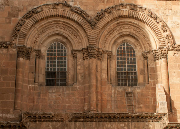 istock Two stone windows of church 1003633798