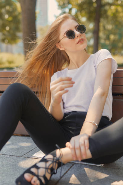 istock Girl with map standing on the street 1003643804