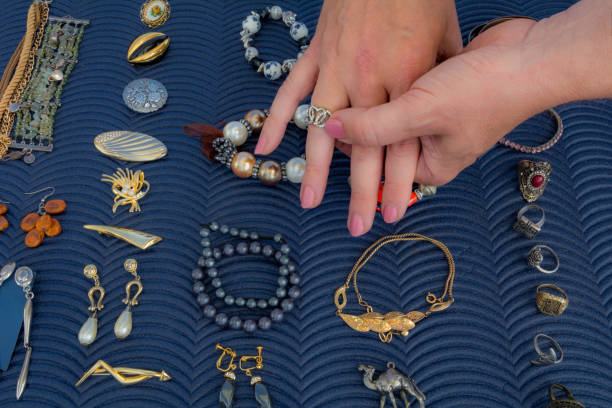 istock Woman  tries rings on flea market 1003648926