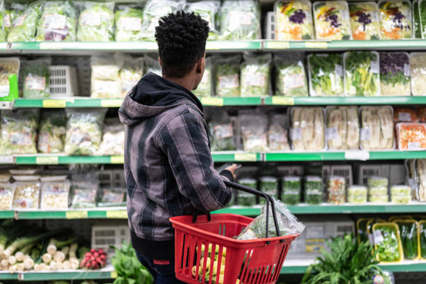 istock Customer Buying Greens on Supermarket 1003652062