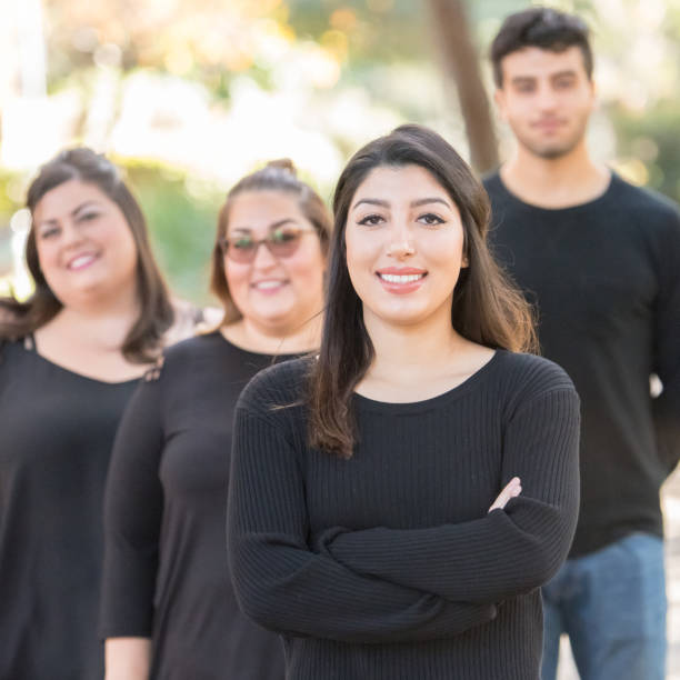 istock Group of four people hanging out together 1003655672