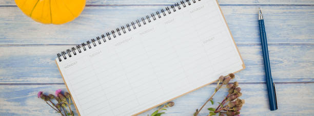 istock Blank planner mock up with autumn pumpkins 1003676038