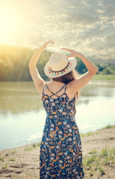 istock Dreamy girl on beach 1003682904