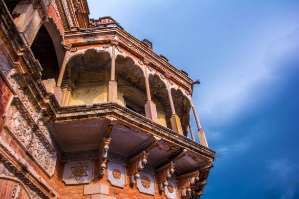 istock An orange color historic building  in Varanasi, India 1003735158