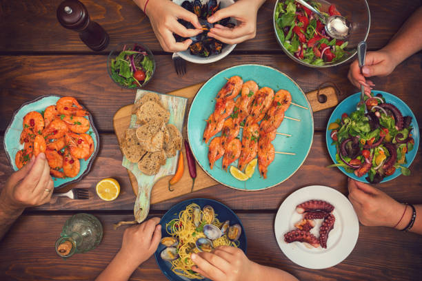 istock Young Family Having Lunch at Home 1003735516