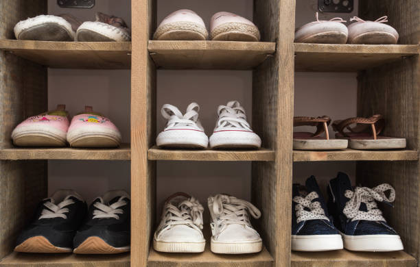 filosof Ripples shampoo Indoor Shoe Rack Of Sneakers Lovers Shoes Stock Photo - Download Image Now  - Shoe, Closet, Entrance Hall - iStock