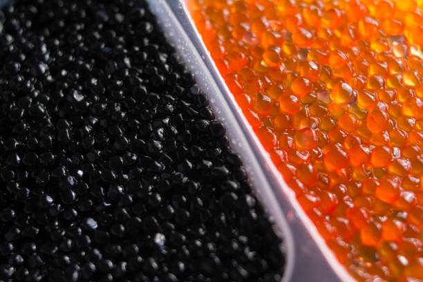 istock red and black caviar of sturgeon. 1003739096