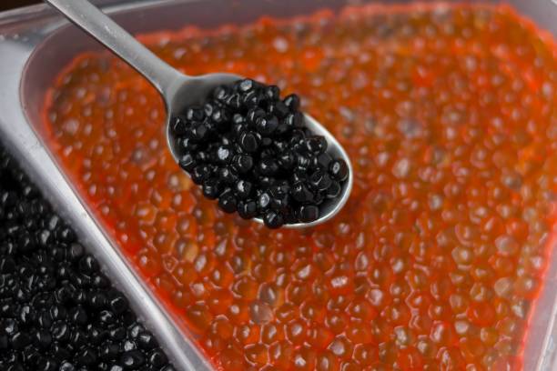 istock red and black caviar of sturgeon. 1003739128