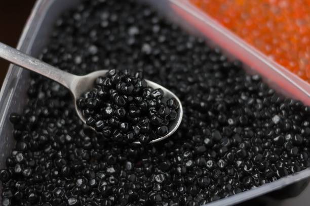 istock red and black caviar of sturgeon. 1003739174