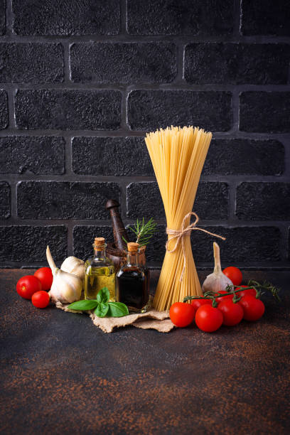 istock Pasta, tomatoes, olive oil and vinegar 1003750436