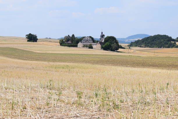 istock Fraukirch in Eifel region during harvest season 1003750980