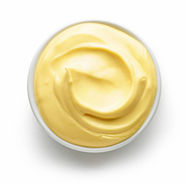 bowl of mayonnaise bowl of mayonnaise isolated on white background, top view hollandaise sauce stock pictures, royalty-free photos & images