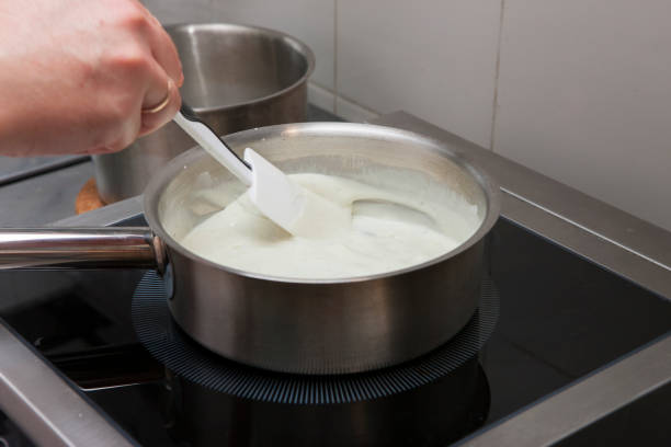 istock Chef prepares cheese sauce Close-up 1003755226