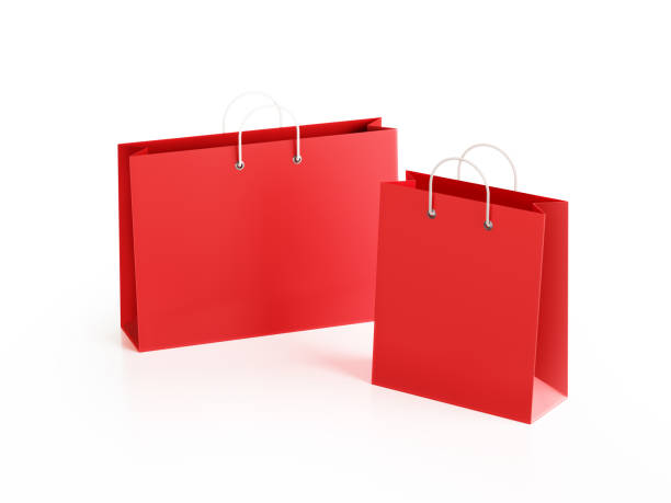 istock Red Shopping Bags Isolated On White Background 1003759900