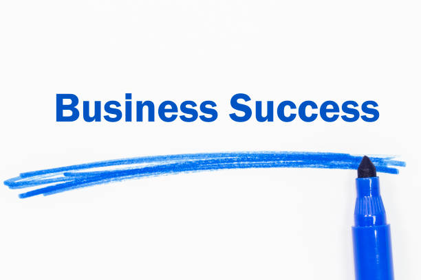 business success word written with marker