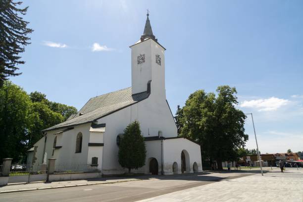 istock Building, Church and town during sunny day with clouds on sky. 1003762988