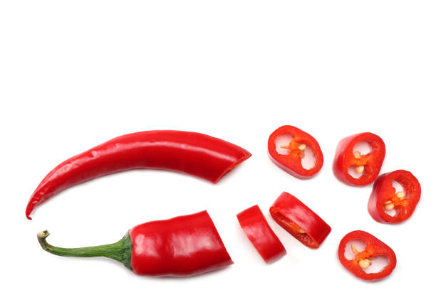 istock sliced red hot chili peppers isolated on white background top view 1003764086