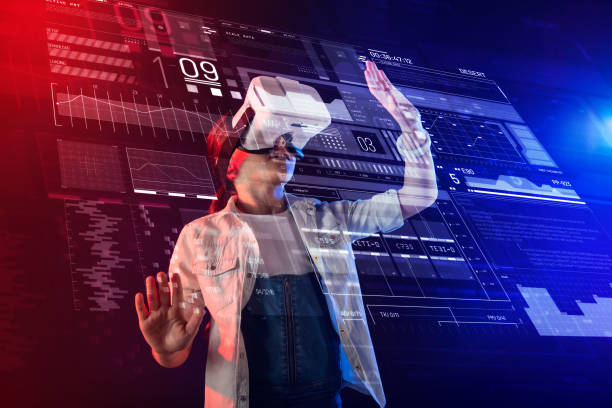 istock Smart pupil touching the hologram while wearing virtual reality glasses 1003778562