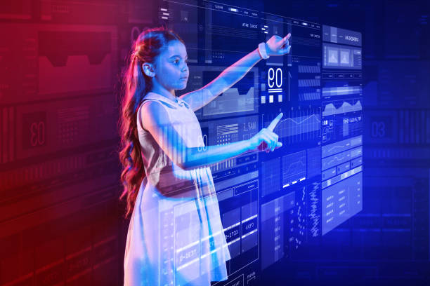 istock Long haired girl touching the screen with two fingers and looking concentrated 1003783262
