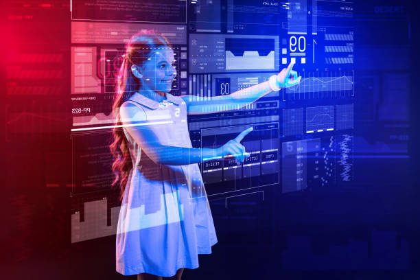 istock Emotional girl feeling happy while using a new futuristic device 1003783284