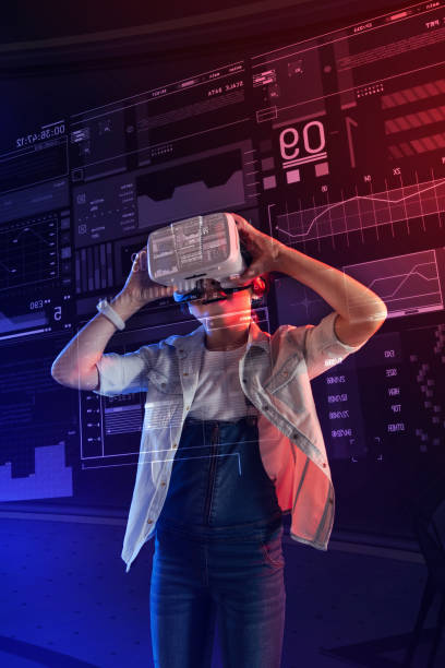 istock Happy child wearing virtual reality device and looking glad 1003790884
