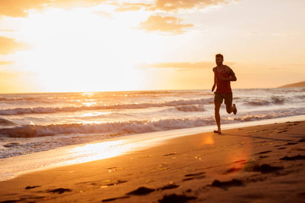 istock Running by the sea 1003793110