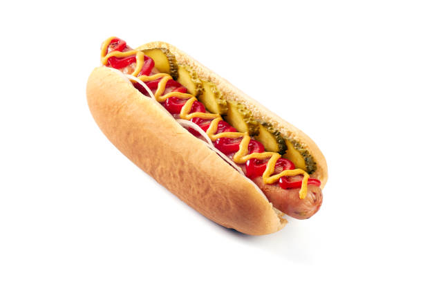 istock Hot dog with with cucumber and onion on white 1003806284
