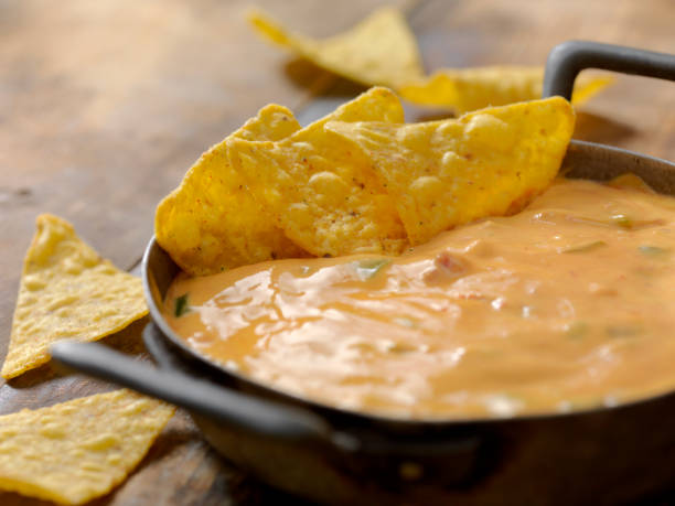 Salsa Cheese Dip Chili Cheese Dip cheese dip stock pictures, royalty-free photos & images