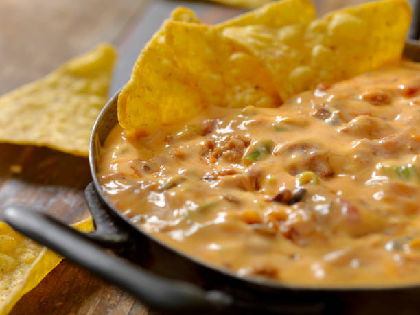 Chili Cheese Dip Chili Cheese Dip nacho chip photos stock pictures, royalty-free photos & images