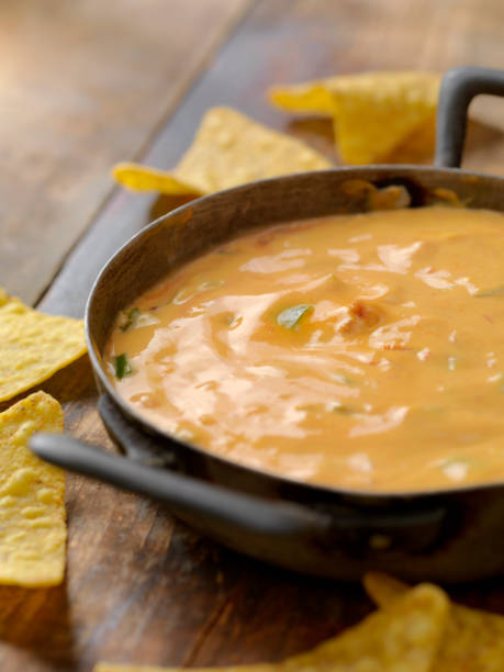 Salsa Cheese Dip Salsa Cheese Dip cheese sauce stock pictures, royalty-free photos & images