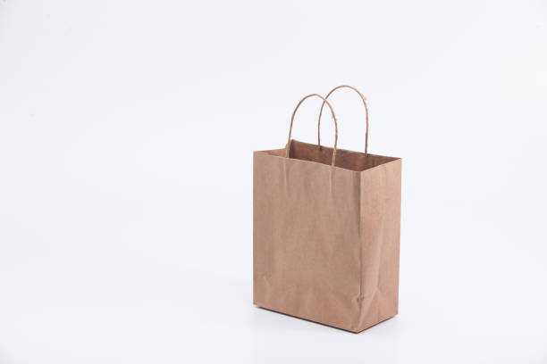 istock Empty recycle brown gift bag isolated on white background 1003824310
