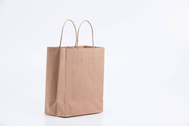istock Empty recycle brown gift bag isolated on white background 1003824402