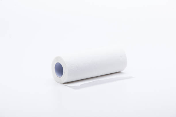 istock Roll of disposable nonwoven fabric towels isolated 1003829498