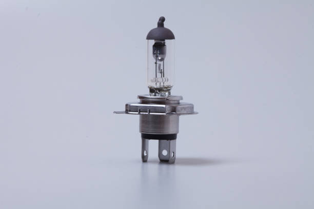 istock Car halogen bulb isolated on gray background 1003832760
