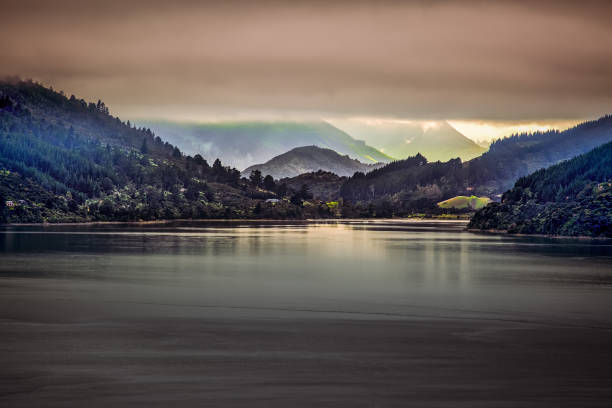 Marlborough Sounds on a gloomy day Mist rain and clouds in the Sounds marlborough new zealand stock pictures, royalty-free photos & images