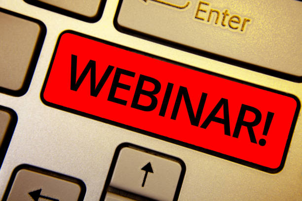 istock Text sign showing Webinar Motivational Call. Conceptual photo Internet distance learning web elearning Keyboard brown keys yellow laptop idea create computer keypad laptop. 1003872576
