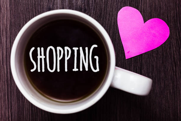 istock Handwriting text Shopping. Concept meaning Shopper customer purchase goods products store experience Mug coffee lovely thoughts ideas love hart romantic memories brown wood. 1003875420