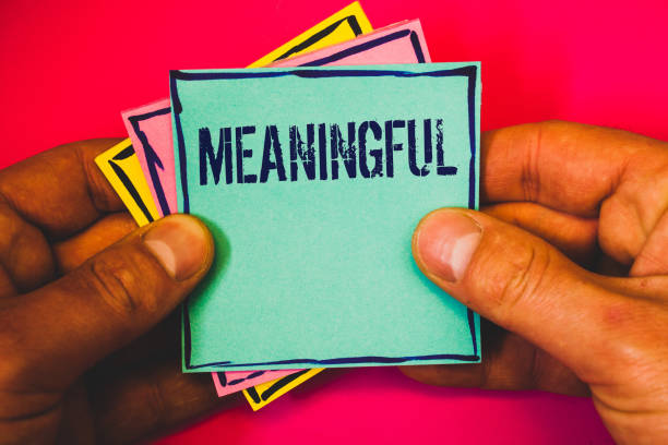 istock Writing note showing Meaningful. Business photo showcasing Having meaning Significant Relevant Important Purposeful Small multi colour notes hand border plane background remember card. 1003875474