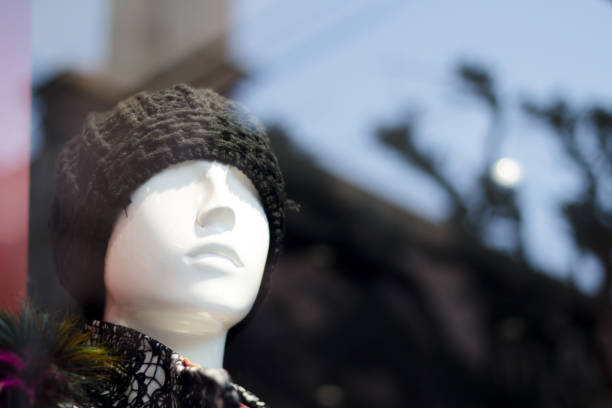 istock Generic mannequin child with winter wool hat. No people 1003878212
